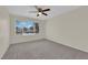 Bedroom boasts a ceiling fan and a large window that provides lots of natural light at 3182 Tarpon Dr # 204, Las Vegas, NV 89120