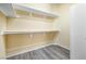Walk-in closet with built-in shelving and neutral walls at 3257 Rushing Waters Pl, Las Vegas, NV 89135