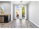 Bright dining area with sliding glass doors leading to the backyard and a view of the pool at 3257 Rushing Waters Pl, Las Vegas, NV 89135