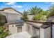 Backyard kitchen featuring a built-in grill, fridge, and countertop space at 3257 Rushing Waters Pl, Las Vegas, NV 89135