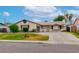 Charming single story home featuring a tile roof and a well-maintained front yard at 3499 Middlebury Ave, Las Vegas, NV 89121