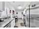 Contemporary kitchen featuring granite countertops and stainless steel appliances at 3499 Middlebury Ave, Las Vegas, NV 89121