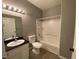 Full bathroom features a vanity, toilet, and shower-tub combo at 4730 E Craig Rd # 1149, Las Vegas, NV 89115