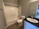 Bright bathroom featuring a shower-tub combo and granite topped vanity at 4730 E Craig Rd # 1149, Las Vegas, NV 89115