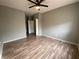 Spacious bedroom features modern flooring, ceiling fan, and neutral-colored walls at 4730 E Craig Rd # 1149, Las Vegas, NV 89115