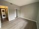 Cozy bedroom features modern floors, closet with sliding doors and convenient washer and dryer hookups at 4730 E Craig Rd # 1149, Las Vegas, NV 89115