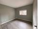 Well-lit bedroom features neutral walls, updated flooring, and a window allowing natural light at 4730 E Craig Rd # 1149, Las Vegas, NV 89115
