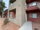 Exterior view of a multi-story building with stucco and balconies at 4730 E Craig Rd # 1149, Las Vegas, NV 89115