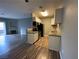 Kitchen with white cabinets, granite countertops, and stainless steel appliances at 4730 E Craig Rd # 1149, Las Vegas, NV 89115
