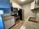 Updated kitchen with stainless steel appliances and granite countertops at 4730 E Craig Rd # 1149, Las Vegas, NV 89115