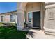 Charming home featuring a secure front door, stucco facade, and manicured landscaping at 5025 Chambliss Dr, Las Vegas, NV 89130