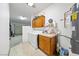 A laundry room featuring wood cabinets and washer and dryer at 5060 Wheatland Dr, Pahrump, NV 89061