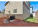 Backyard features seating on red rocks, and sunny skies above at 5200 Paradise Skies Ave, Las Vegas, NV 89156