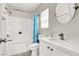 Bathroom featuring tub with shower, neutral counter, and modern sink at 5200 Paradise Skies Ave, Las Vegas, NV 89156
