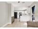 Bright kitchen featuring white cabinets, stainless steel appliances, and ample counter space at 5200 Paradise Skies Ave, Las Vegas, NV 89156