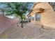 This home's backyard boasts drought-resistant landscaping, a great look that minimizes water use at 6061 Moonlight Sonata Ave, Las Vegas, NV 89122