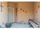 A cozy front porch with potted plants and decorative touches at 6061 Moonlight Sonata Ave, Las Vegas, NV 89122