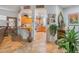 Open-concept living space with tile flooring and kitchen view at 6061 Moonlight Sonata Ave, Las Vegas, NV 89122