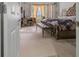 The primary bedroom boasts natural lighting, a comfortable area for getting ready, and plenty of space to relax at 6061 Moonlight Sonata Ave, Las Vegas, NV 89122