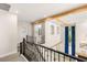 Elegant hallway with hardwood floors, natural light, and modern architectural details at 6315 Bellisima St, Las Vegas, NV 89118