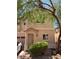Two-story home featuring a welcoming entrance, a well-maintained lawn, and an attached garage at 8355 Pearl Beach Ct, Las Vegas, NV 89139