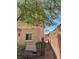 Charming home exterior featuring neutral stucco, manicured landscaping, and an inviting facade at 8355 Pearl Beach Ct, Las Vegas, NV 89139
