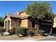 Beautiful exterior view featuring desert landscaping and a two-car garage at , Las Vegas, NV 89178