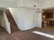 Open living space with staircase and view into the kitchen at , Las Vegas, NV 89178