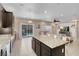 Bright kitchen featuring granite countertops, stainless appliances and open floor plan at 10135 Haymarket Peak Ave, Las Vegas, NV 89166