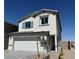 Charming two-story home featuring a two car garage and a well-maintained yard with blue shutters at 10442 Luna Mezza Ave # Lot 187, Las Vegas, NV 89141