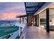 This exterior view offers balconies overlooking the golf course with glass railings at 11660 Summit Club Dr # 204, Las Vegas, NV 89135