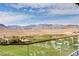 Stunning mountain views overlooking the lush golf course at 11660 Summit Club Dr # 204, Las Vegas, NV 89135