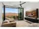 Comfortable home theater featuring plush seating, large-screen TV, and scenic outdoor views at 11660 Summit Club Dr # 204, Las Vegas, NV 89135