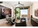 Contemporary office space with balcony, modern art, and panoramic views for inspiring work at 11660 Summit Club Dr # 204, Las Vegas, NV 89135