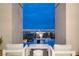 Relaxing patio area with city skyline views at 11660 Summit Club Dr # 204, Las Vegas, NV 89135