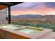 Stunning outdoor pool and patio area with mountain and golf course views at 11660 Summit Club Dr # 204, Las Vegas, NV 89135