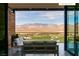 Covered terrace with outdoor seating providing views of the golf course and mountain range at 11660 Summit Club Dr # 204, Las Vegas, NV 89135