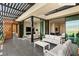 A large terrace offers seamless indoor-outdoor living with comfortable seating and panoramic views at 11660 Summit Club Dr # 204, Las Vegas, NV 89135