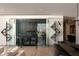 Modern wine room with glass enclosure, custom racking, and display lighting, perfect for wine enthusiasts at 11660 Summit Club Dr # 204, Las Vegas, NV 89135