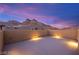 Open rooftop terrace featuring beautiful mountain views and outdoor lighting at 11676 Midnight Melody Ave, Las Vegas, NV 89138