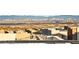 Stunning city skyline view from this rooftop vista, enhanced by the surrounding neighborhood at 11676 Midnight Melody Ave, Las Vegas, NV 89138