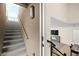 Staircase leads to the second level of the home, with entry to open-concept living at 11676 Midnight Melody Ave, Las Vegas, NV 89138