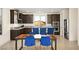 Eat-in kitchen with granite counters, stainless appliances and island seating at 11676 Midnight Melody Ave, Las Vegas, NV 89138