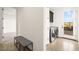 Convenient laundry room with modern washer/dryer, cabinetry, and access to the backyard, adding ease to chores at 11676 Midnight Melody Ave, Las Vegas, NV 89138