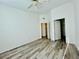 Spacious bedroom featuring natural light and wood-look laminate floors at 1881 W Alexander Rd # 2117, North Las Vegas, NV 89032