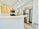 Bright kitchen features a breakfast bar, stainless steel appliances, and ample cabinet space at 1881 W Alexander Rd # 2117, North Las Vegas, NV 89032
