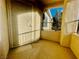A private patio with a decorative security door offers a cozy outdoor space at 1881 W Alexander Rd # 2117, North Las Vegas, NV 89032