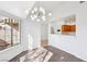 Dining area with modern lighting and views into the kitchen at 1911 Hobson Dr, Henderson, NV 89074