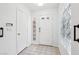 Inviting foyer with tile flooring and glass block details at 1911 Hobson Dr, Henderson, NV 89074