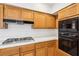 Close up of the kitchen showcasing the gas stove and built-in oven at 1911 Hobson Dr, Henderson, NV 89074